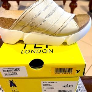 Brand new Fly London sandals
